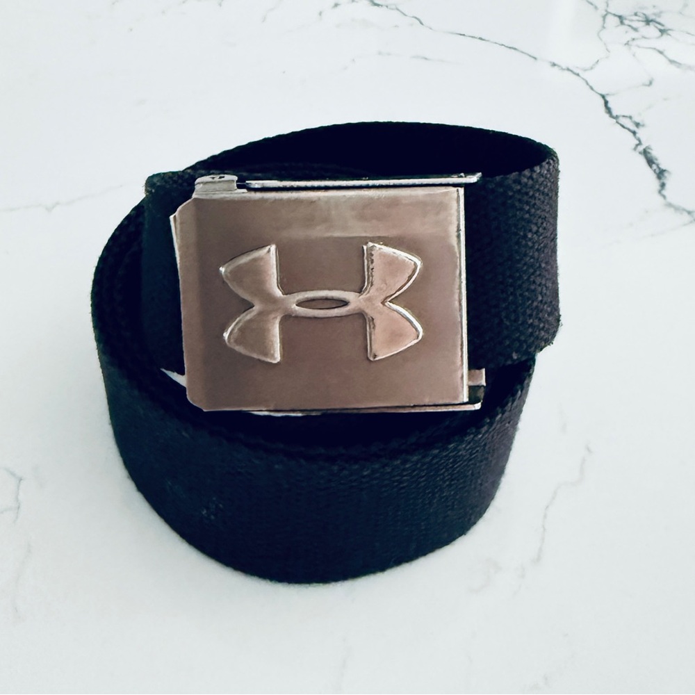 Black men’s Under Armour Black Webbing Belt with Silver Metal Tip
